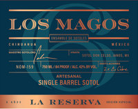 A close-up of a spirit label for Los Magos Reserva Single Barrel Sotol, featuring dark teal and orange typography on a dark teal patterned background.