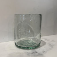 Hand-blown recycled glass rocks glass with visible bubbles and a soft green tint